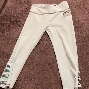 I am selling these blue Capri leggings. They have a cute design on the bottom.